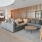 a living room with a couch and chairs