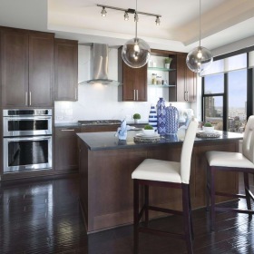 a kitchen with a table and chairs