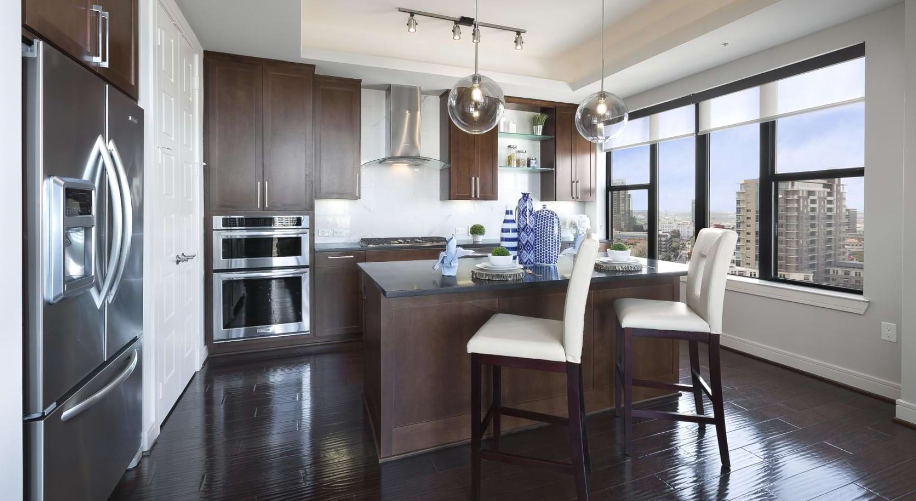 a kitchen with a table and chairs