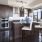 a kitchen with a table and chairs