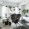 a living room with a chair and a table