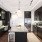 a kitchen with black cabinets