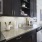 a kitchen with black cabinets