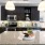 a kitchen with black cabinets