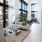 a room with a patio and a couch and a table