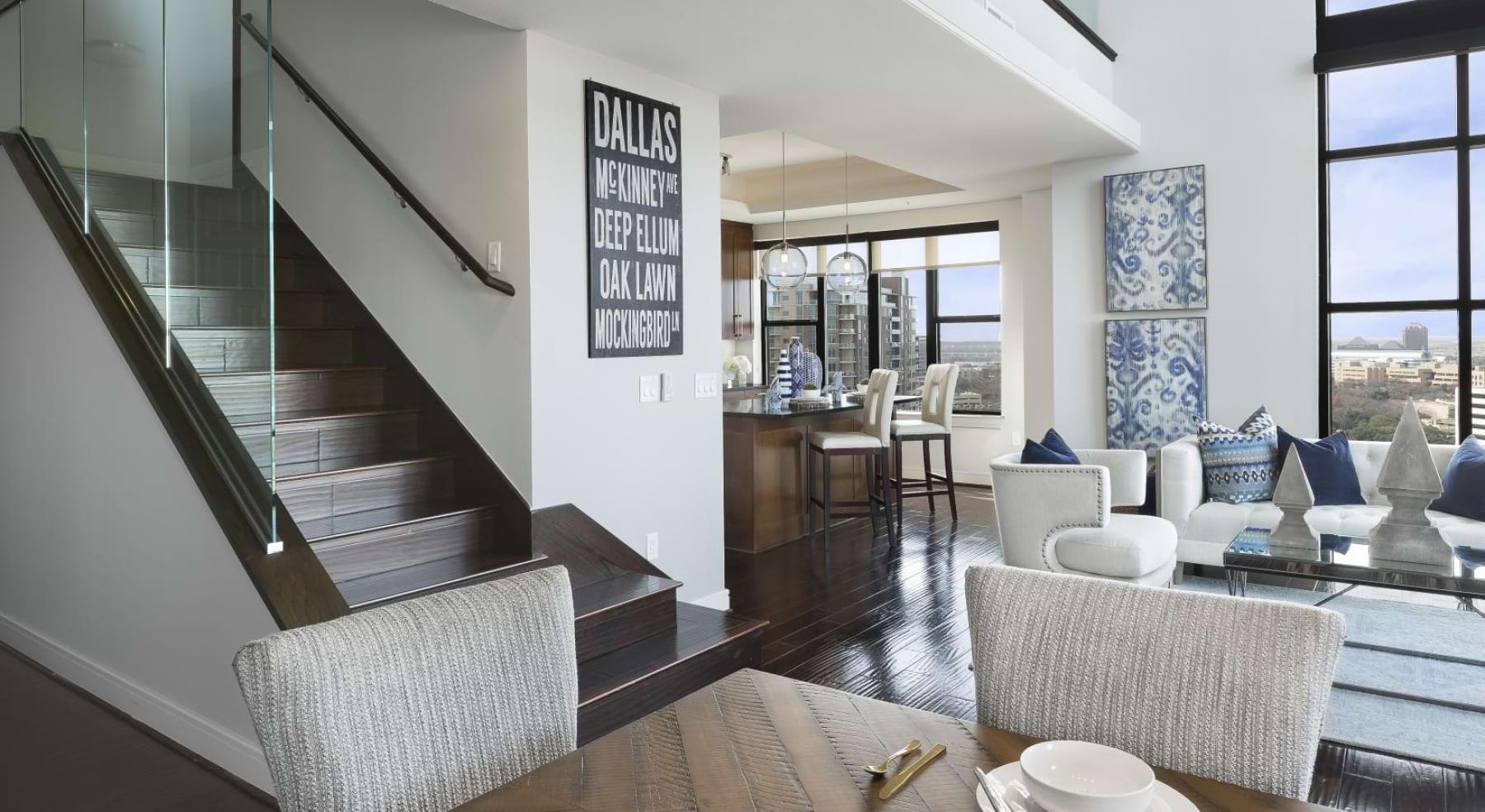 a modern looking kitchen with a glass wall