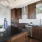 a kitchen with a black countertop