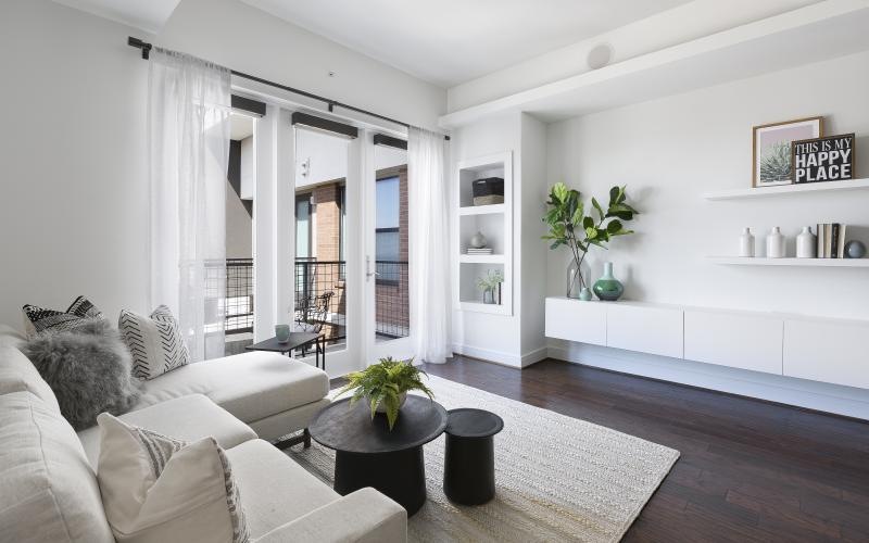 a living room with a large glass door