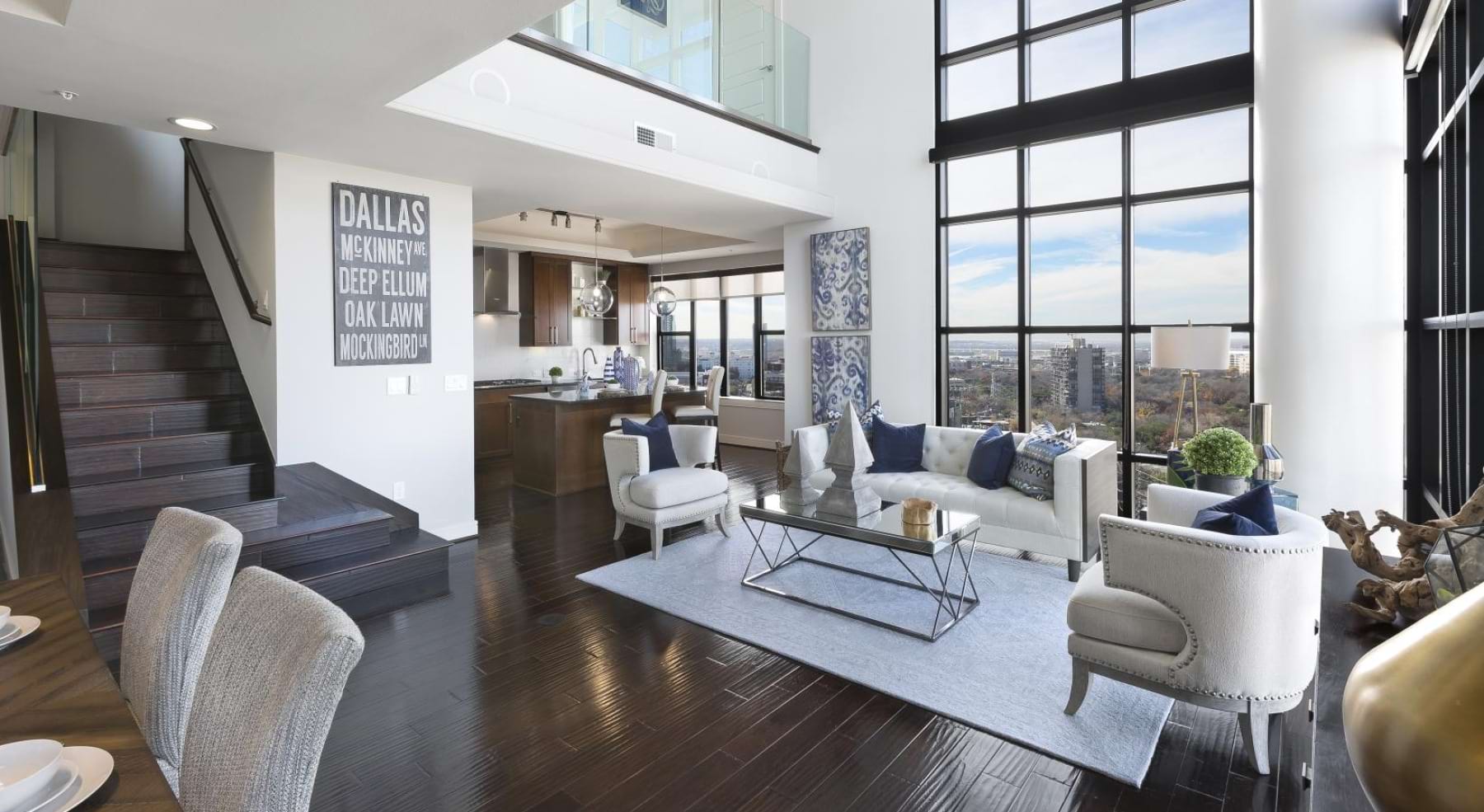 a modern looking living room with a large glass window
