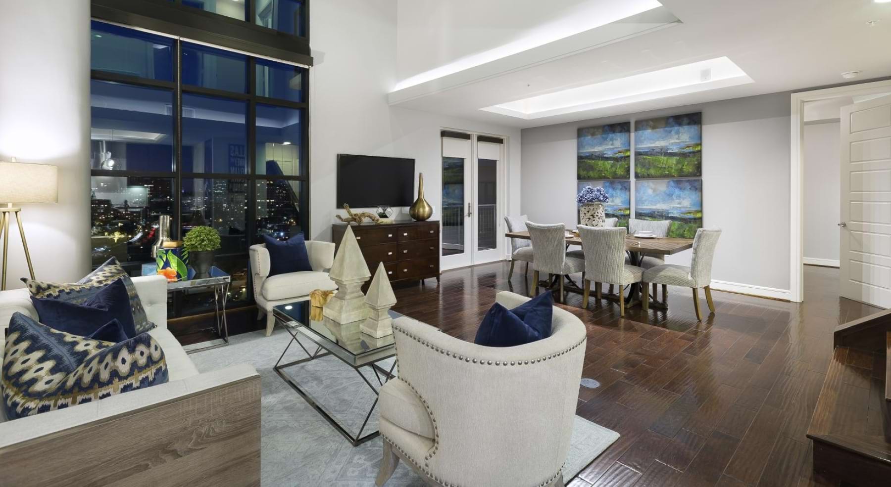 a large living room with a large window