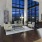 a room with a large window and chairs