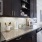 a kitchen with black cabinets